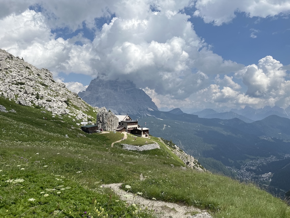 The much-coveted Rifugio Coldai, as seen on my return from the two-days Tour of Mount Civetta trail. From there, it&rsquo;s only one more hour of descent till the parking, where my trusty Triumph Bonneville awaits.