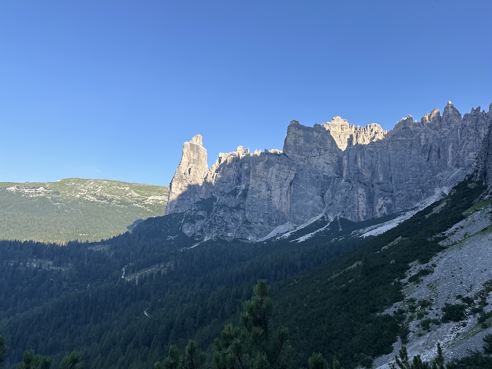 Torre Venezia (left) illuminated by the first light of dawn. I climbed the tower some 30 years ago. As always in mountaineering, the structure seen from afar is much more awe-inspiring than when you are in its arms.